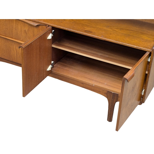 330 - A Mid Century teak cocktail side cabinet by Sutcliffe. 152x43x116cm