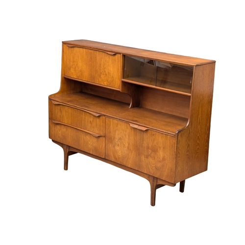 330 - A Mid Century teak cocktail side cabinet by Sutcliffe. 152x43x116cm