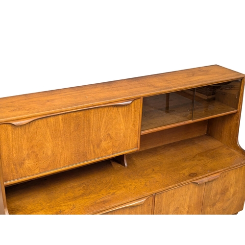 330 - A Mid Century teak cocktail side cabinet by Sutcliffe. 152x43x116cm