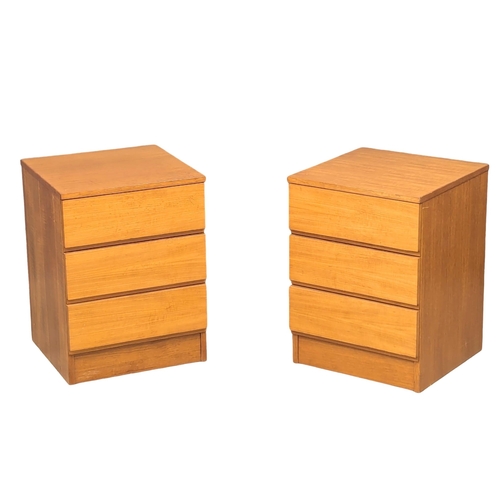 340 - A pair of Mid Century teak bedsides by Jentique. 41x40x55cm