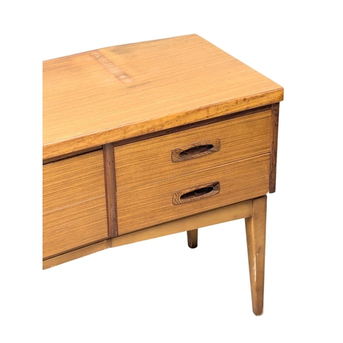 341 - Frank Guille. A Mid Century teak sideboard designed by Frank Guille for Austinsuite. 153x44x66.5cm