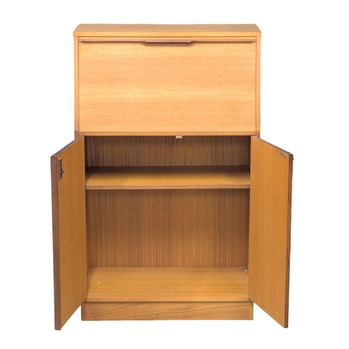 354 - A Mid Century teak bureau. 69x28x110.5cm. (3)