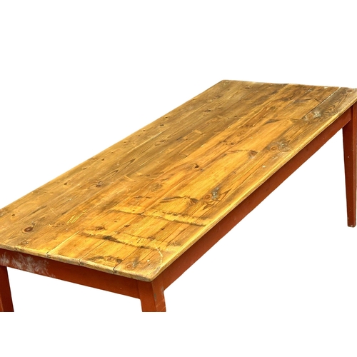 37 - A large Early 20th Century Shakers style pine farmhouse kitchen table. 203x86x77cm