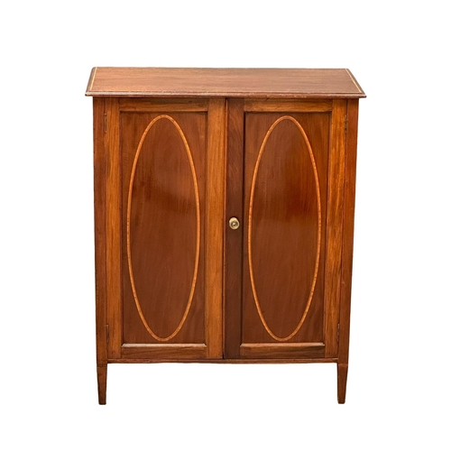 379 - An Edwardian, Sheraton Revival inlaid mahogany side cabinet, with interior shelves. 76x39x92cm. (3)