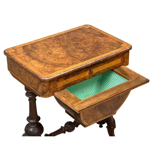 38 - A 19th Century Victorian burr walnut work table/side table, with maple interior drawer and carved ba... 