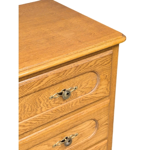 402 - A 18th Century style French oak chest of drawers. 83x45x76cm