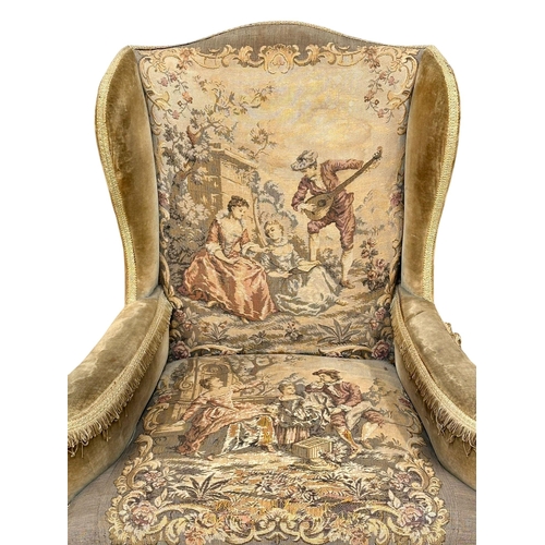 407 - An Early 20th Century Century Queen Anne style wingback armchair. Circa 1920.