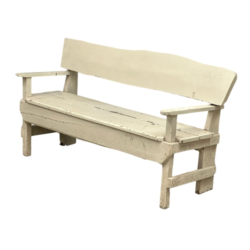 408 - A rustic garden bench. 162cm