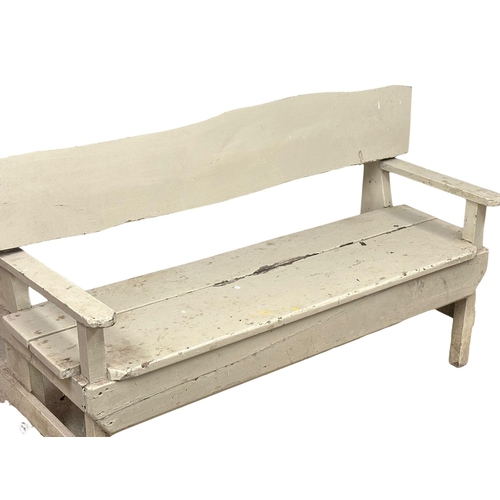 408 - A rustic garden bench. 162cm