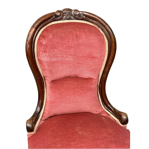 411 - A 19th Century Victorian spoon back bedroom chair/ladies chair on cabriole legs. Circa 1860-1870.