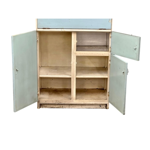 519 - A 1950’s Mid Century kitchen cabinet. 75x41x179cm. (3)