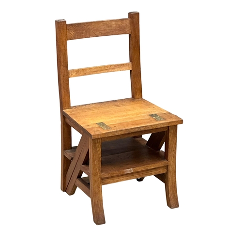 52 - A large good quality oak metamorphic library chair.