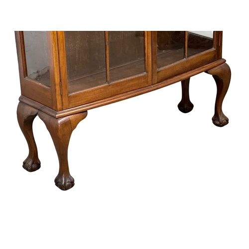 544 - An Early 20th Century Georgian style mahogany display cabinet. 107x30x153cm