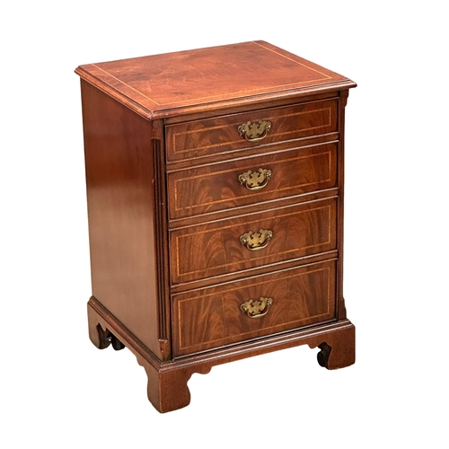 575 - A Georgian style inlaid mahogany side chest with interior drawers. 53x46x74.5cm.