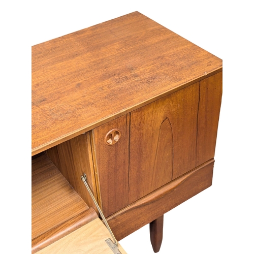 58 - A 1960’s Mid Century teak sideboard by Portwood. 183x45x78cm