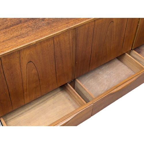 58 - A 1960’s Mid Century teak sideboard by Portwood. 183x45x78cm