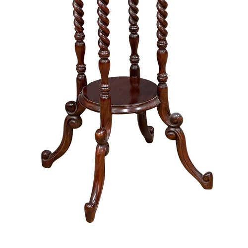 580 - A Victorian style mahogany barley twist jardiniere stand/plant stand on cabriole legs. 99cm