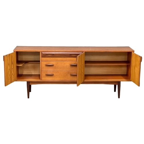 72 - A Mid Century teak sideboard. 1960’s. 181.5x41x76cm