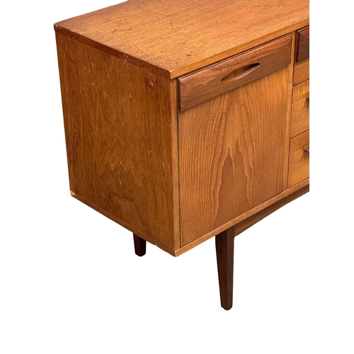 72 - A Mid Century teak sideboard. 1960’s. 181.5x41x76cm