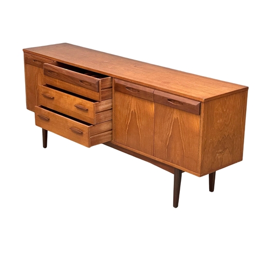 72 - A Mid Century teak sideboard. 1960’s. 181.5x41x76cm