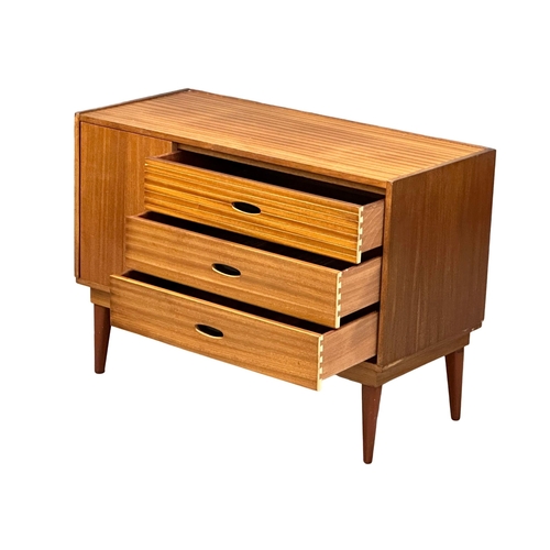 73 - Frank Guille for Austinsuite. A 1960’s Mid Century teak compact sideboard, designed by Frank Guille ... 