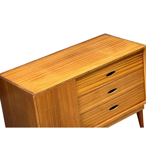 73 - Frank Guille for Austinsuite. A 1960’s Mid Century teak compact sideboard, designed by Frank Guille ... 