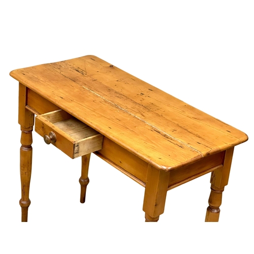 784 - A 19th Century Victorian pine farmhouse side table with drawer and turned legs. 90x43x74cm.