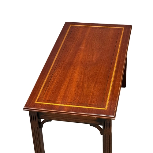 786 - An inlaid mahogany coffee table. In the George III/Chinese Chippendale style. 99x48x50cm