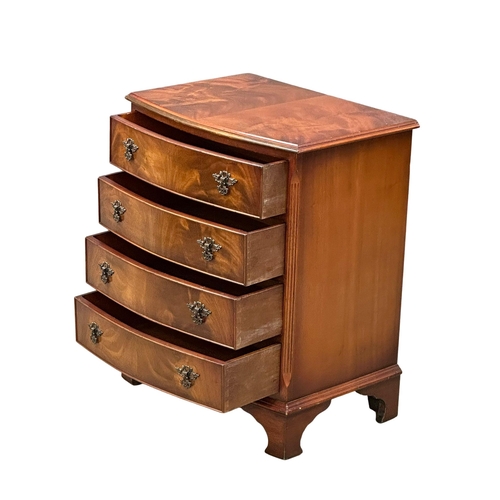 790 - A Georgian style mahogany bow front side chest of drawers on bracket feet. 63x45x78cm