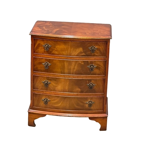 790 - A Georgian style mahogany bow front side chest of drawers on bracket feet. 63x45x78cm