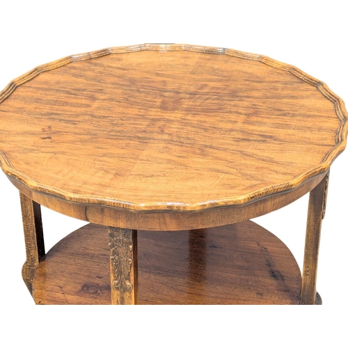 817 - A Mid 20th Century 2 tiered occasional table. 60x52cm