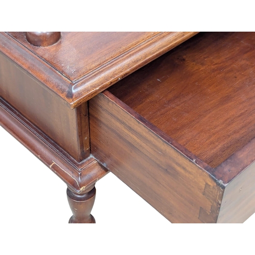 821 - A large Victorian style mahogany whatnot. 66x40x146cm