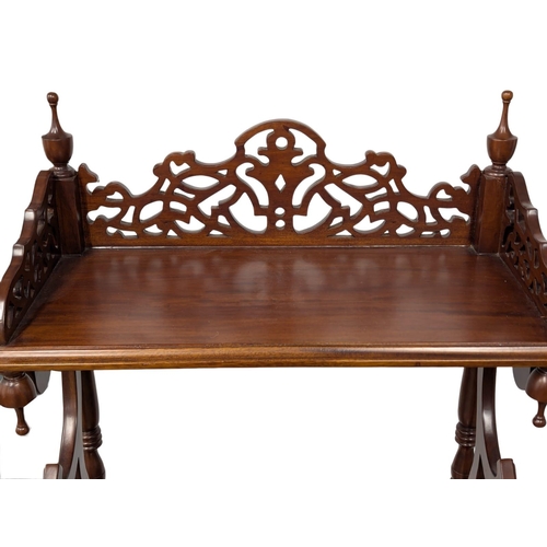 821 - A large Victorian style mahogany whatnot. 66x40x146cm