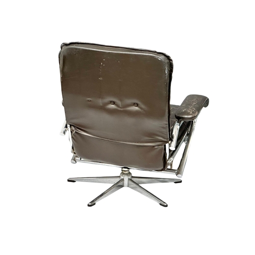 863 - A Danish Mid Century leather and chrome framed armchair.