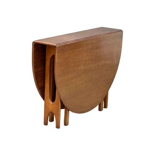 871 - A Mid Century teak drop leaf dining table by Jentique. Open 154x108x74cm.