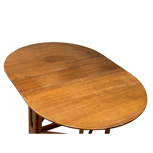 871 - A Mid Century teak drop leaf dining table by Jentique. Open 154x108x74cm.