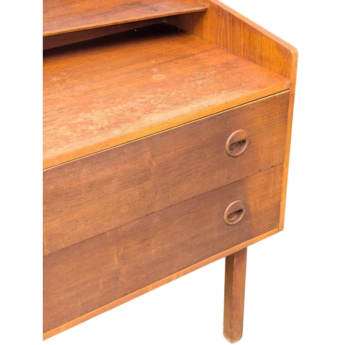 897 - A Mid Century teak dressing table. 137x42x75cm. (5)