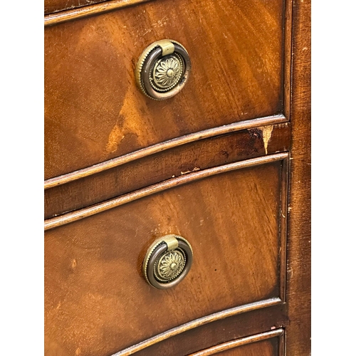 919 - A Georgian style mahogany serpentine front chest of drawers. 54x42x93cm