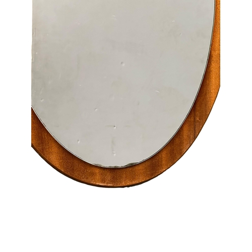 925 - A Mid Century teak framed mirror. 37x57cm