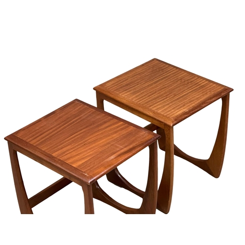 93 - A GPlan style Mid Century teak coffee table, with 2 nesting tables. In the manner of Victor Wilkins.