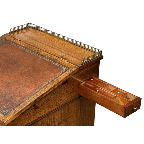 95 - A George IV rosewood davenport desk with leather top. Circa 1820.