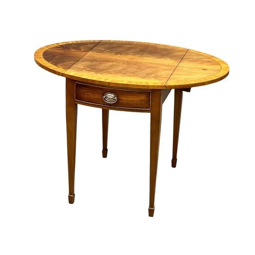 953 - A Georgian style inlaid mahogany drop leaf table with drawer. Open 98x71.5x69cm. Closed 50x71.5x69cm