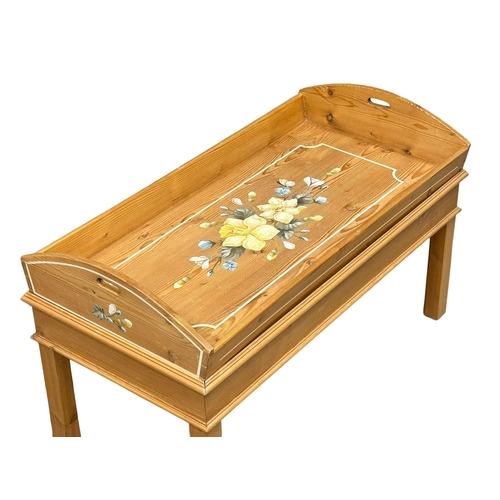 977 - A pine butlers tray coffee table. 95x47x56cm