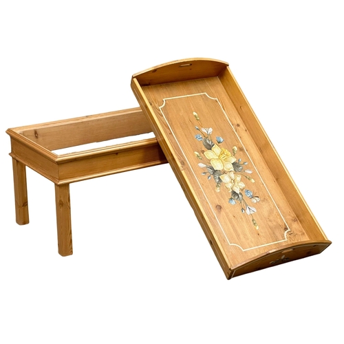 977 - A pine butlers tray coffee table. 95x47x56cm