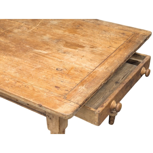 99 - A 19th Century Victorian pine farmhouse kitchen table with drawer. 130x95.5x73cm