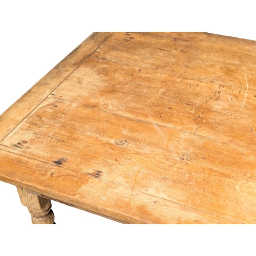 99 - A 19th Century Victorian pine farmhouse kitchen table with drawer. 130x95.5x73cm