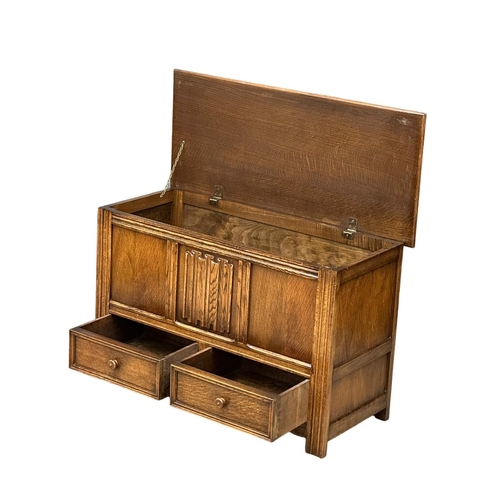 993 - A vintage oak 18th Century style storage box, with 2 drawers. 99x43x62cm