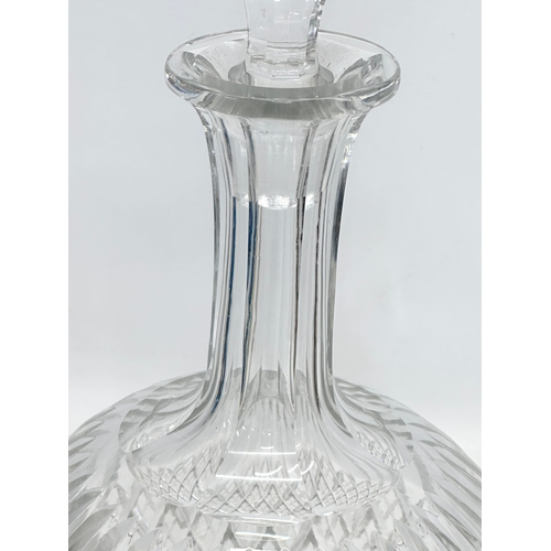 177 - A very large 19th Century Victorian slice and diamond cut magnum decanter. 42cm.