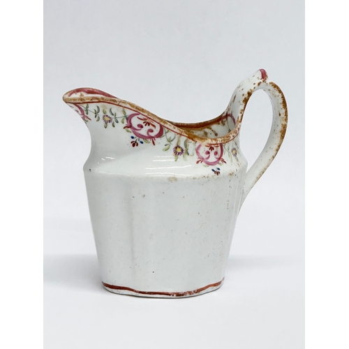 179 - A Late 18th Century English soft paste cream jug by New Hall. Circa 1780.