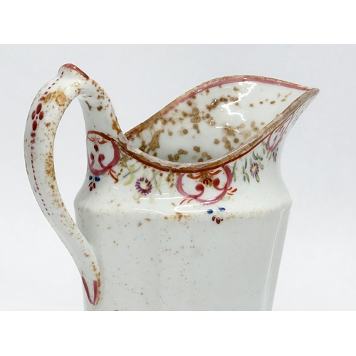 179 - A Late 18th Century English soft paste cream jug by New Hall. Circa 1780.